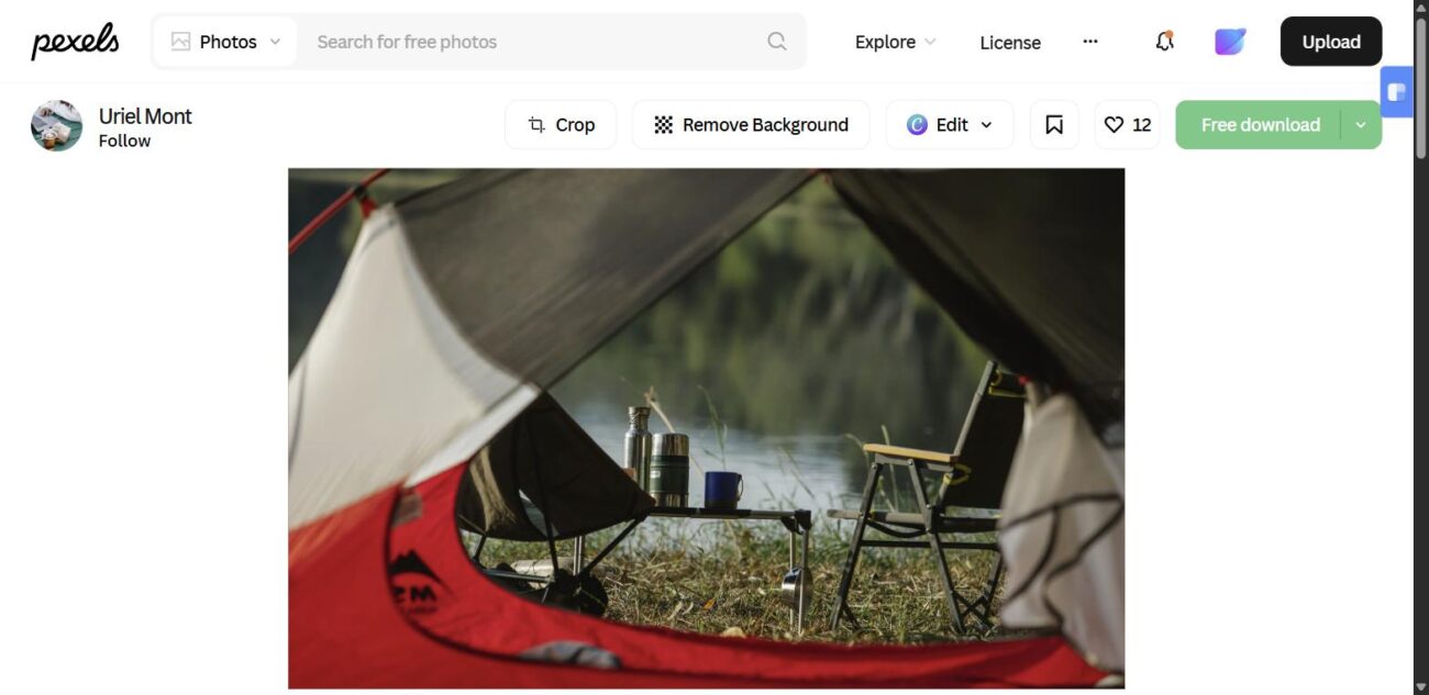 Organized camping equipment beside an open rooftop tent
